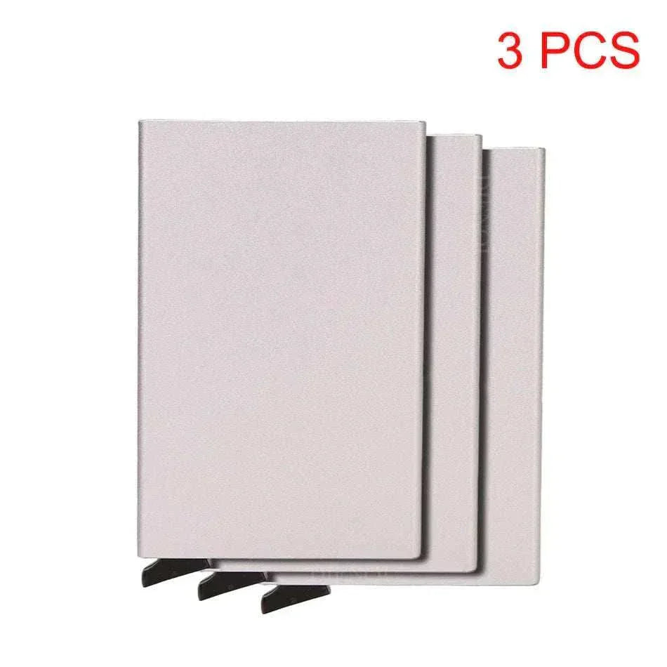 Slim black metal RFID credit card holder with pop-up feature for men and women