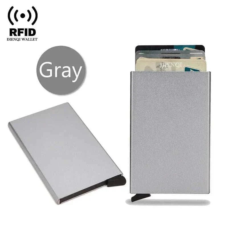 Slim black metal RFID credit card holder with pop-up feature and RFID blocking technology for men and women